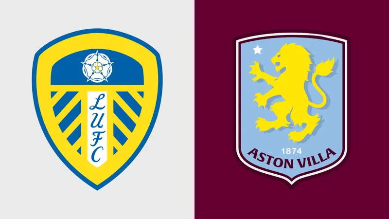 Cầu thủ Aston Villa điều chỉnh bóng trước sự áp lực từ Leeds